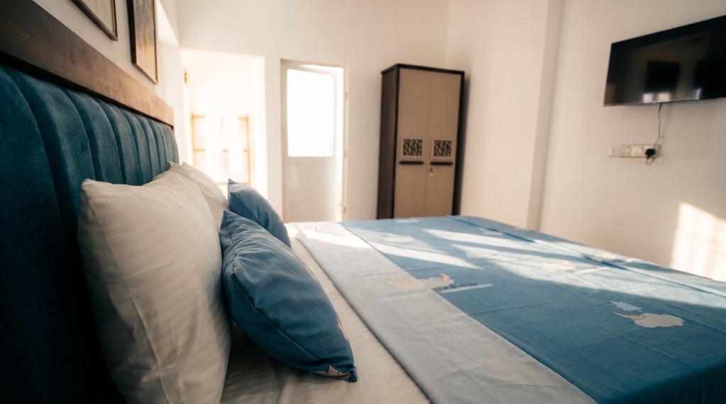 King Bedroom Suite with In-Room TV & Wardrobe