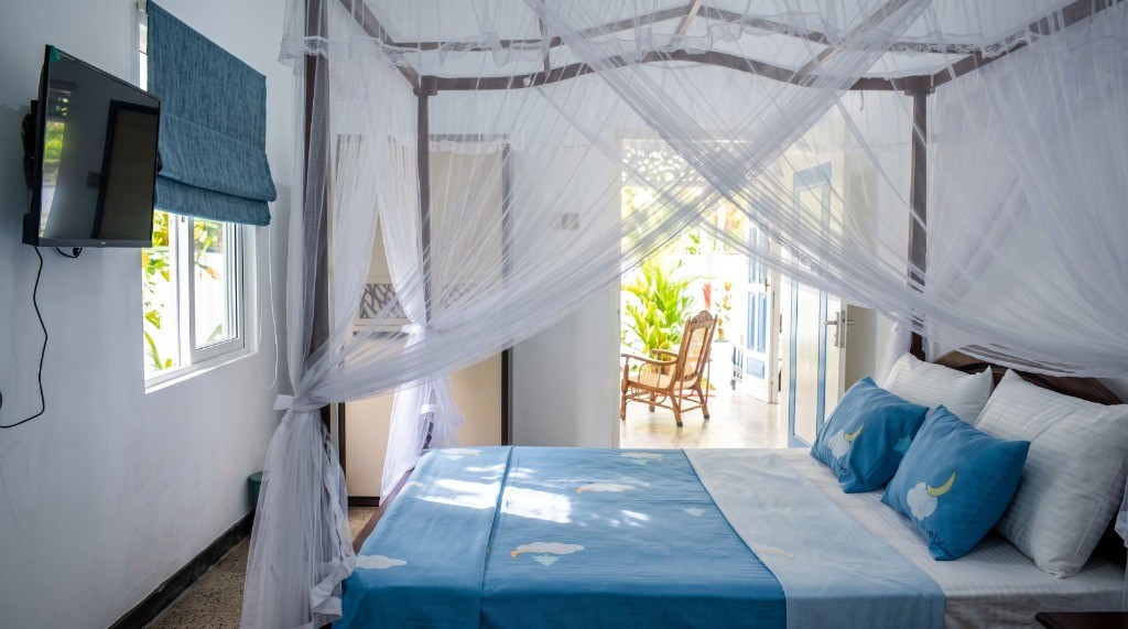 Deluxe Double Room - Canopy Bed, TV & Garden Veranda View